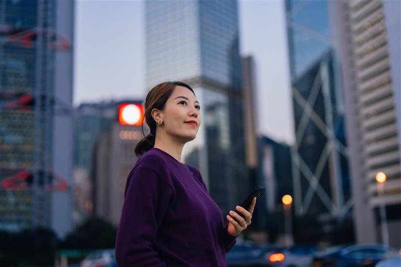 Girl standing near buildings