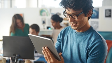 Asian-man-using-ipad-or-tablet