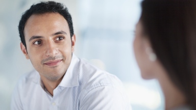 Co-worker-smiling-listening