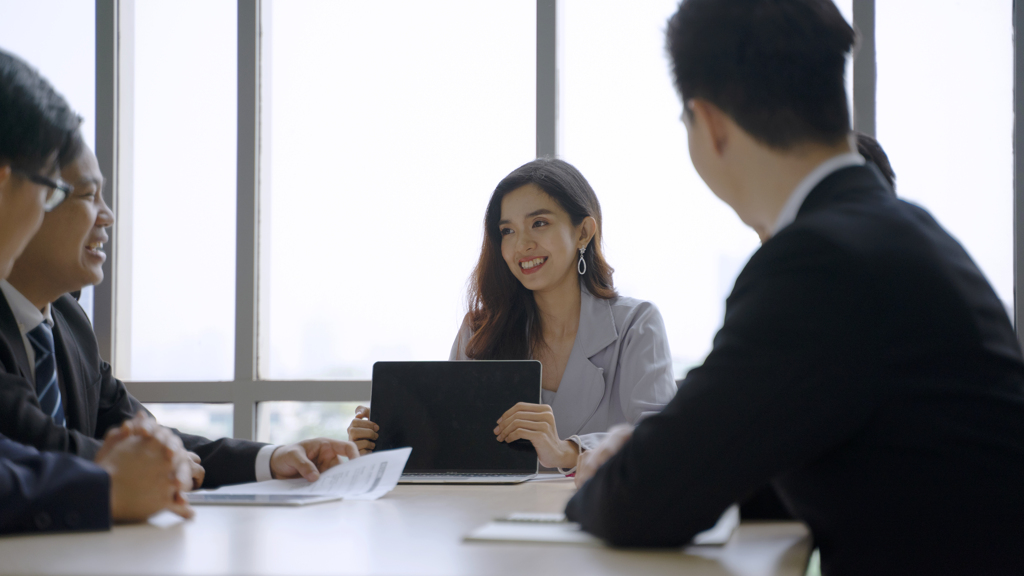 Smiling-colleagues-having-meeting