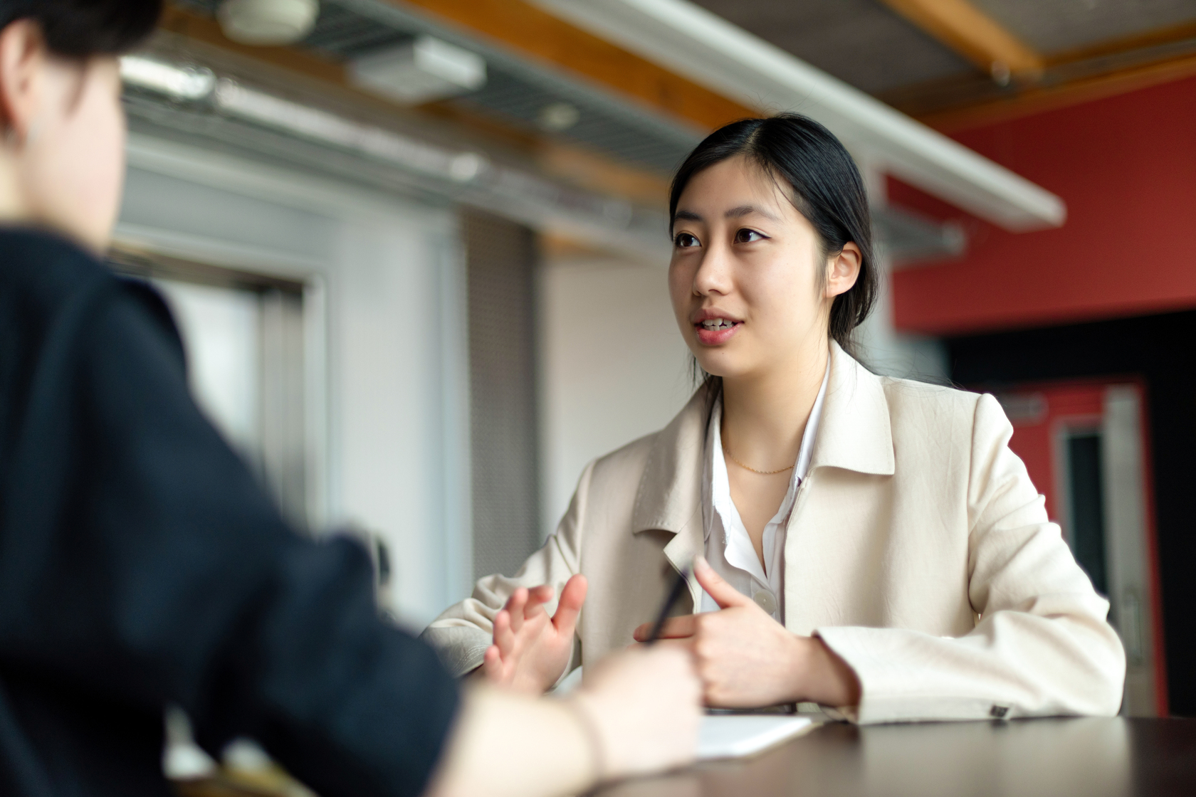young-asian-woman-conversing-1680x1120