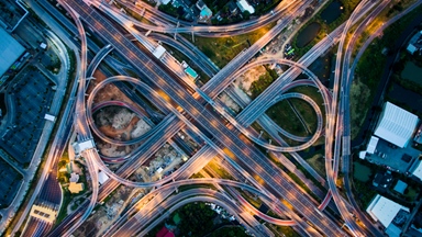 fast-movement-aerial-shot-blue-and-yellow-cars
