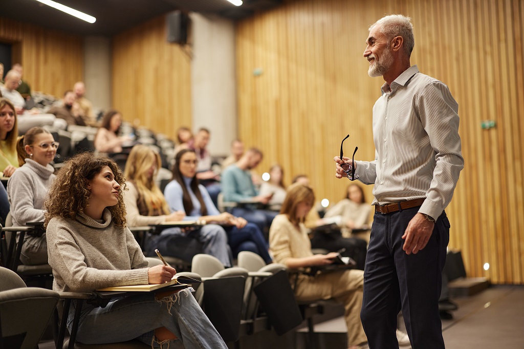 Veteran teacher giving a lecture to students