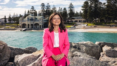 Katina Law sitting at the beach