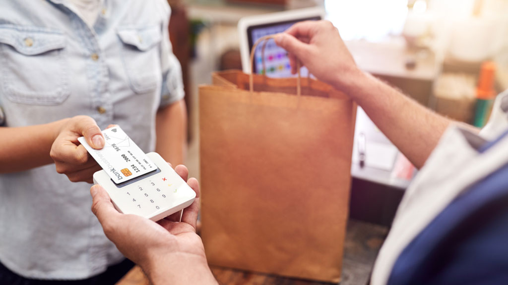 woman-paying-by-card