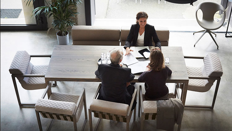 3 people business meeting table