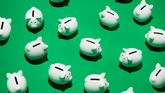 Piggy banks green background