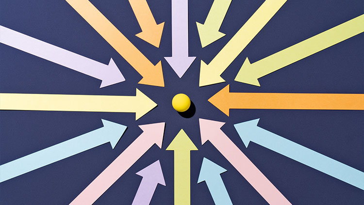 Coloured arrows pointing to yellow ball