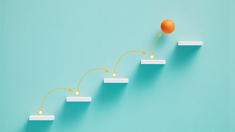 Illustration of an orange sphere moving upwards across a series of floating white steps against a light blue background. Curved arrows trace the sphere’s path from one step to the next, symbolising steady progress, growth and achievement through successive stages.