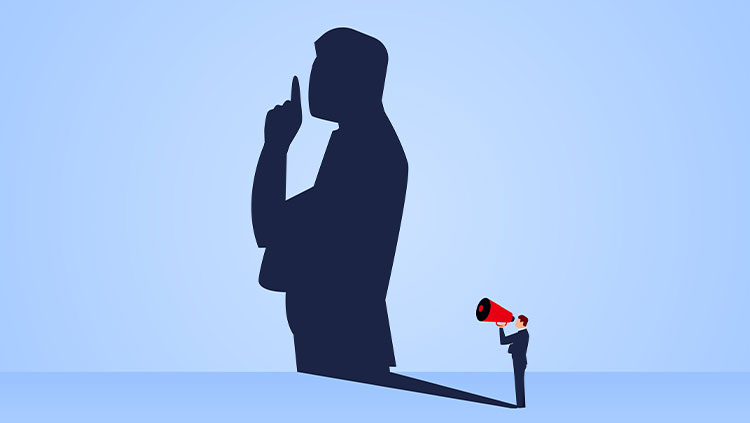 Person with speaker shadow telling to be quiet