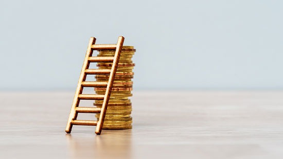 Stack of coins with gold ladder