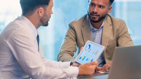 Two business people working office