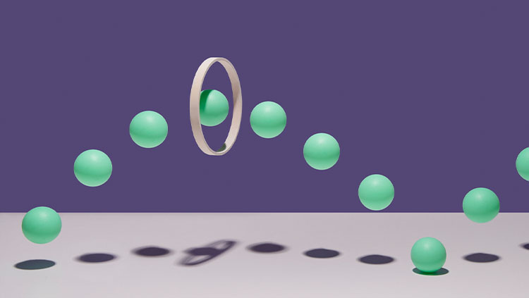 Balls going through hoop