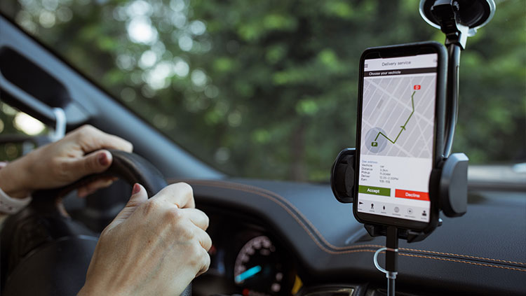 Gig economy car driver smart phone dash