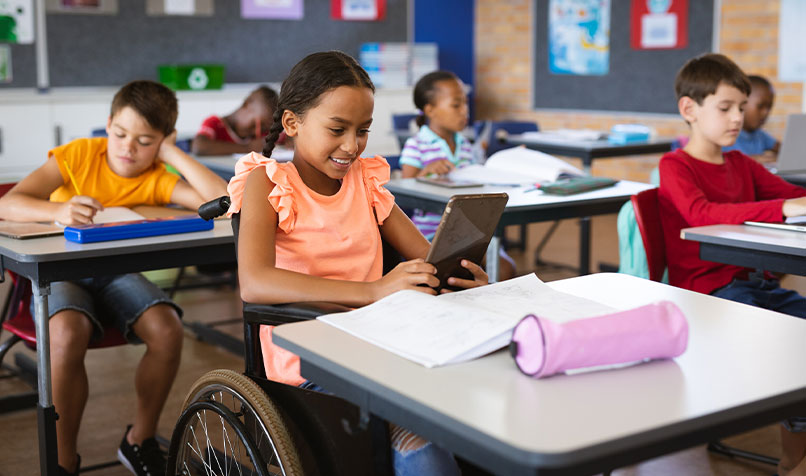 Girl wheelchair classroom