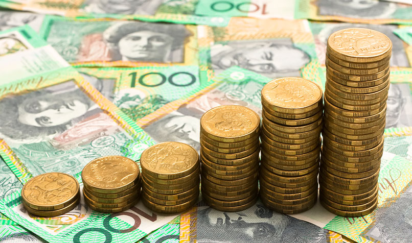 Australian 100 dollar notes coins stacked