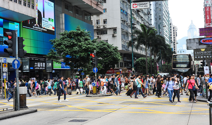 Hong kong street people crossing road