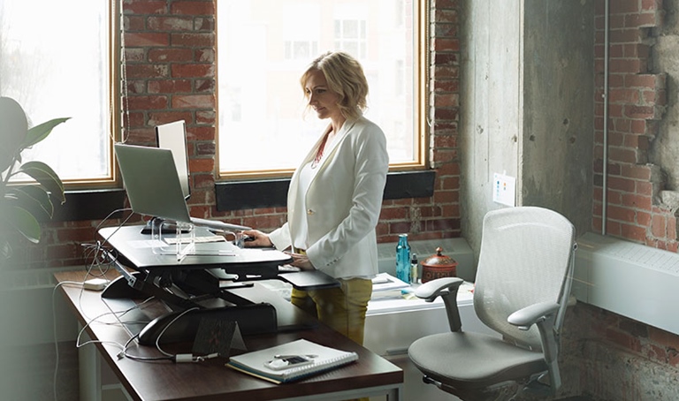 person on standing desk