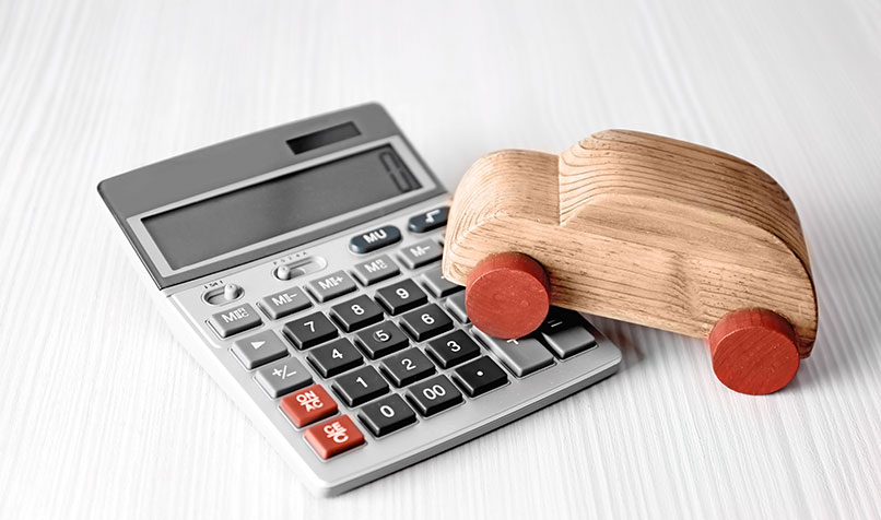 calculator and wooden toy car