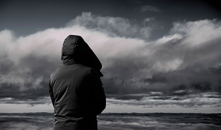 person looking at storms