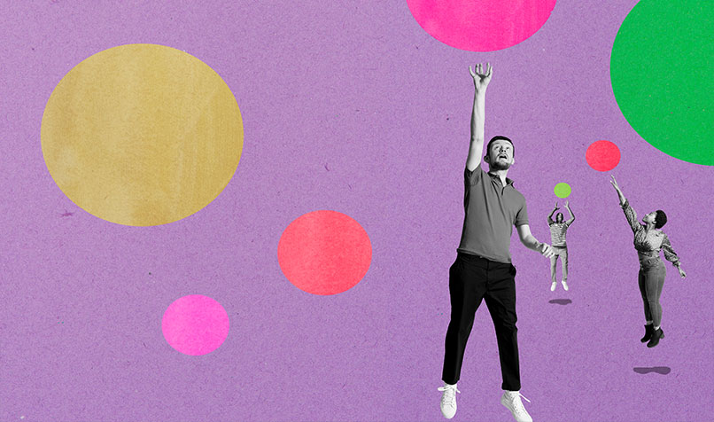 people reaching balloons