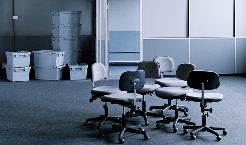 Empty office chairs boxes