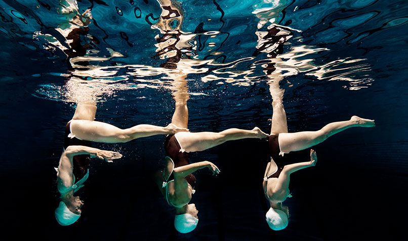Synchronized swimming women line