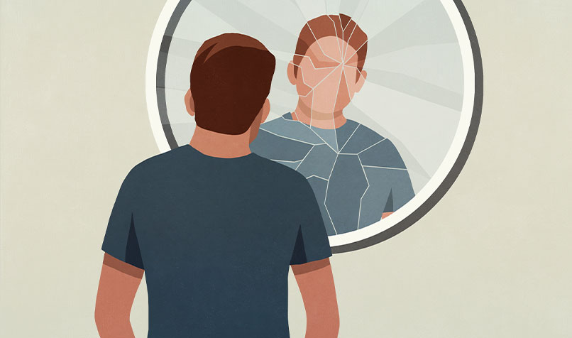 Man looking mirror cracked