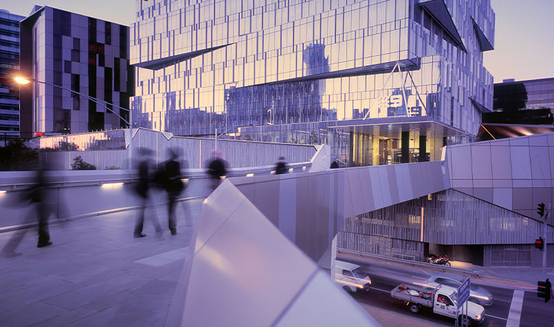Office building people walking blurry