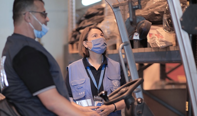 Jenifer Austen UNRWA warehouse forklift