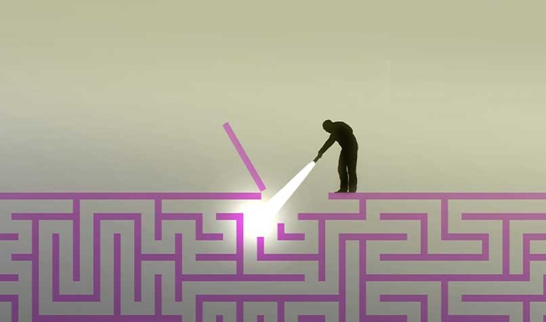 Person looking torch maze
