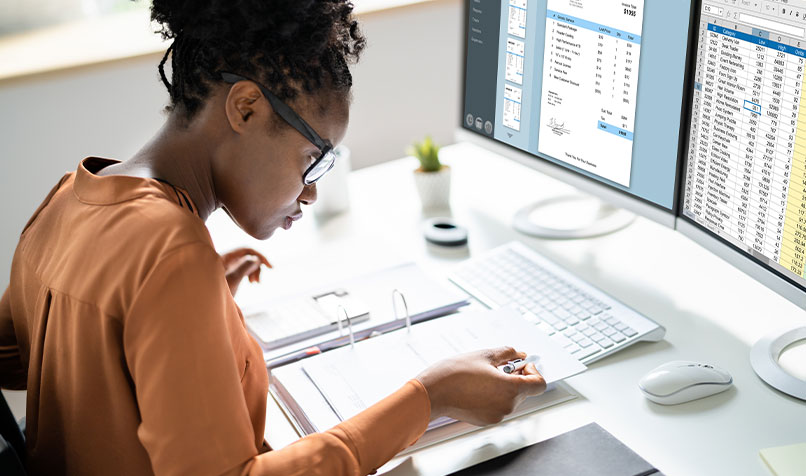 Woman working computer desk