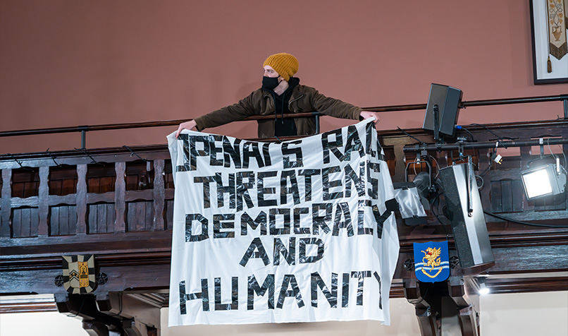 protestor Sam Altman visit to The Cambridge union
