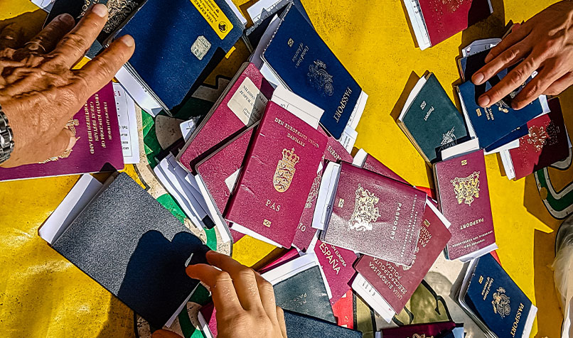 Yellow tabletop multiple passports various countries