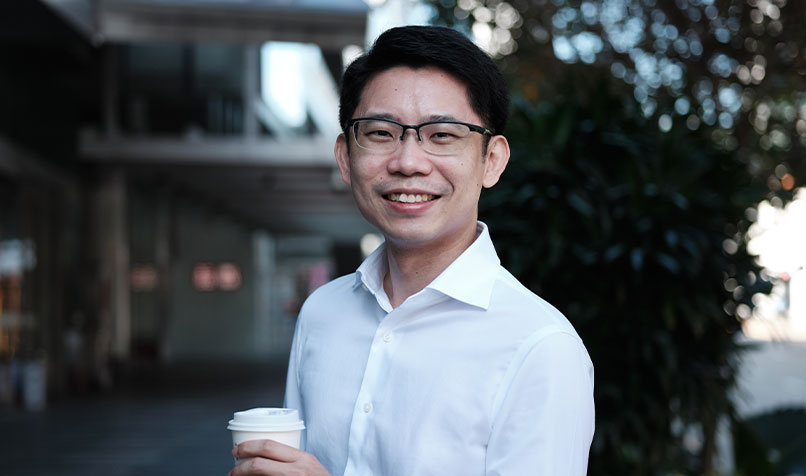 Lim Wei Ri standing outside