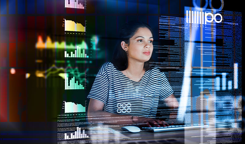 Person looking screen graphs words