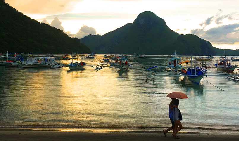 Beach people walking Philippines