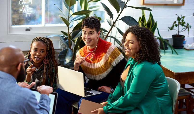 Group people sitting talking informal