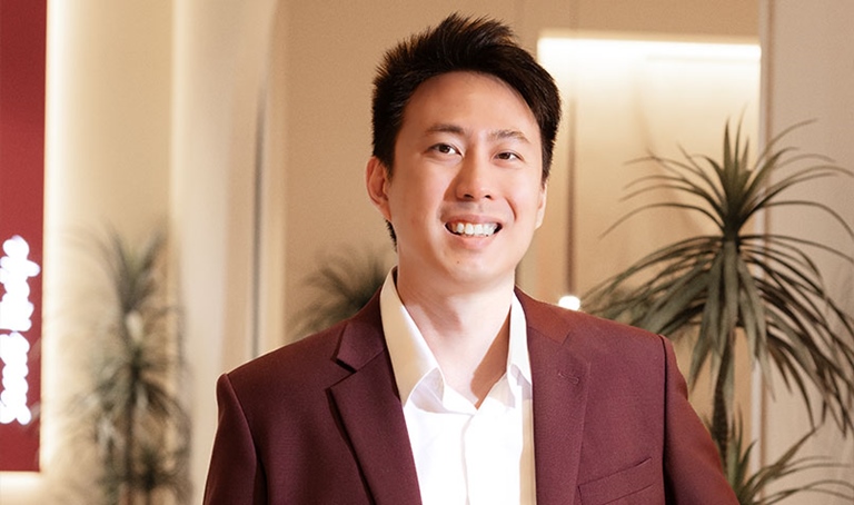 Patrick Sim standing close up