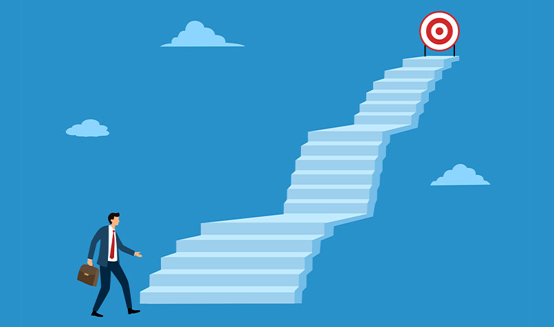 Business person bottom stairs target at top