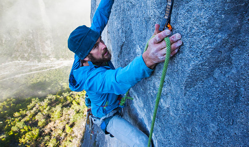 Close up rock climber rock face