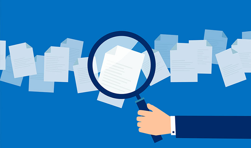 Magnifying glass documents hand