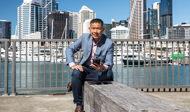 Mitchell Pham ONZM FCPA sitting