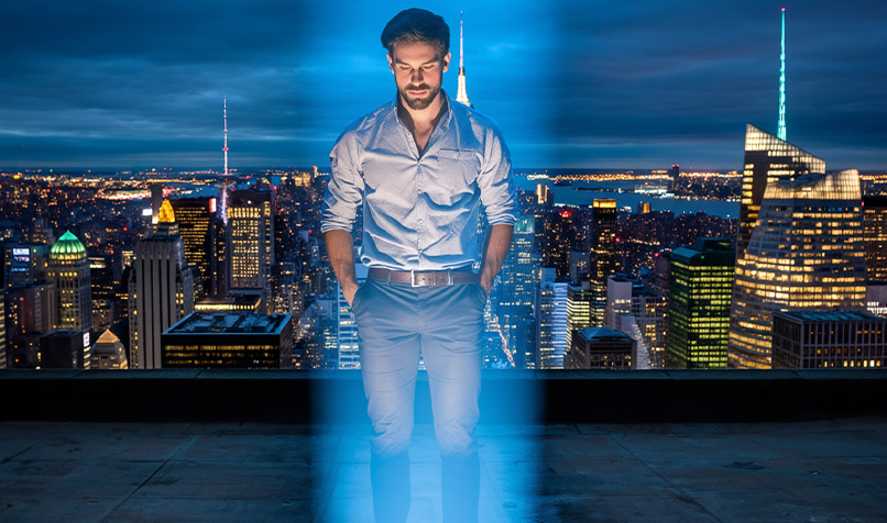 City person lit up in blue light