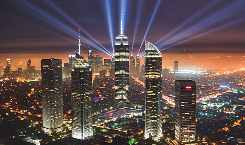 City scape night time lights in sky