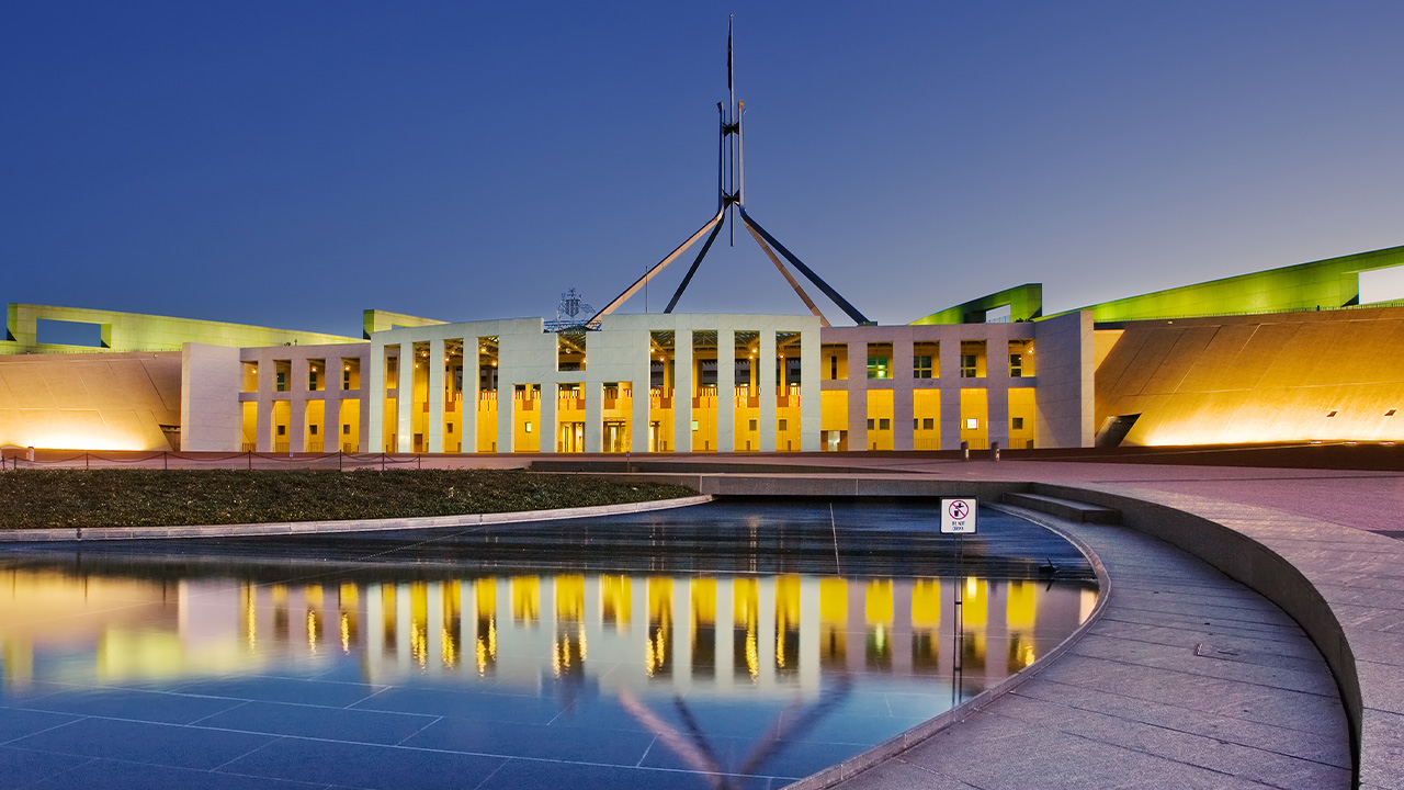 Australian Parliament house in Canberra at dusk