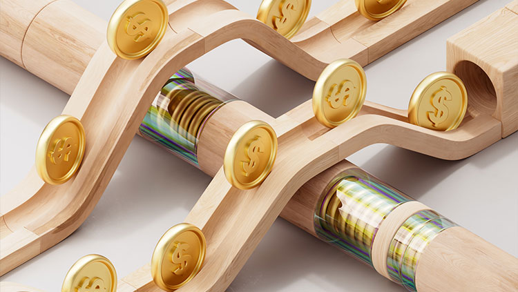 Coins rolling on wooden track