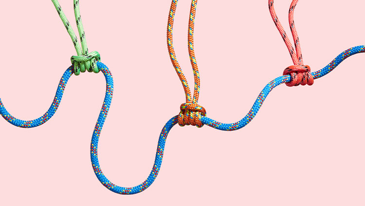 one large rope supported 3 smaller ropes