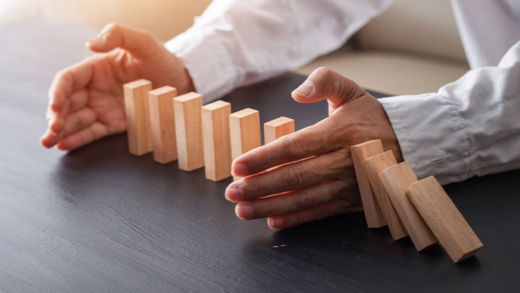 Wooden blocks falling person stopping