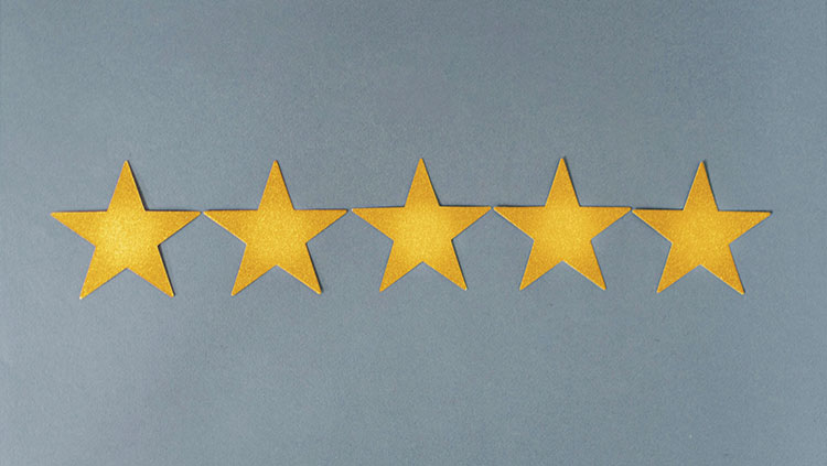 5 yellow stars grey background
